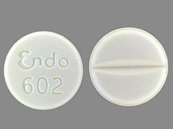 White round Endocet 5-325 mg tablet imprinted “Endo 602” representing oxycodone/acetaminophen pain relief medicine.