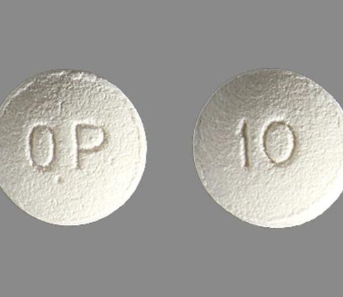 OxyContin 10 mg Extended‑Release Tablet – Oxycodone Pain Medicine. White round OxyContin 10 mg tablet (extended‑release oxycodone) with “OP 10” marking.