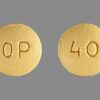 Yellow OxyContin 40 mg extended-release oxycodone tablet marked “40” for chronic pain relief.