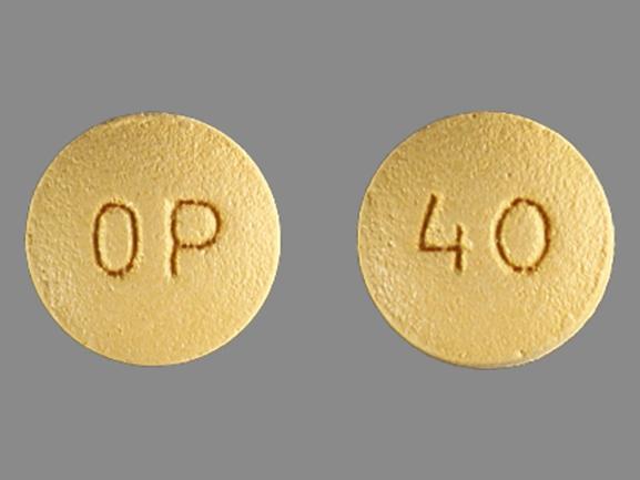Yellow OxyContin 40 mg extended-release oxycodone tablet marked “40” for chronic pain relief.