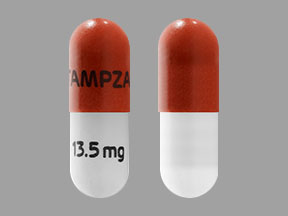 Xtampza ER 13.5 mg Extended-Release Oxycodone Capsule – Severe Pain Medicine. Beige and red Xtampza ER 13.5 mg extended-release oxycodone capsule for chronic pain relief.